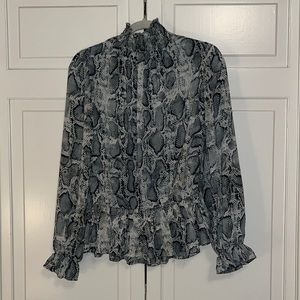 Green, white, and black snakeskin top